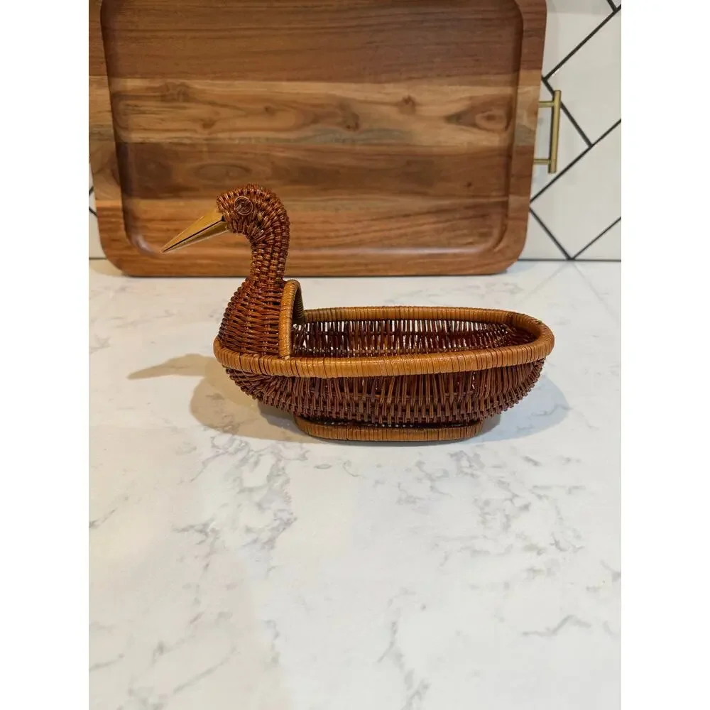 handwoven rattan duck basket elongated oval bowl design integrated duck head